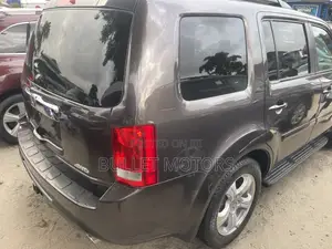 Honda Pilot EX-L 4dr SUV 4WD w/Rear Entertainment (3.5L 6cyl 5A) 2014