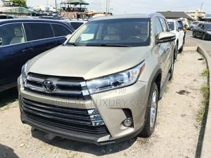 Toyota Highlander Limited V6 4x2 (3.5L 6cyl 6A) 2016 Gold