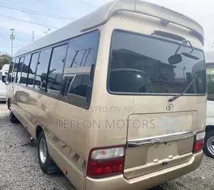 Toyota Coaster 2015 Gold