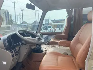 Toyota Coaster 2015 Gold