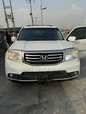 Honda Pilot Touring w/RES/Navi 4WD (3.5L 6cyl 5A) 2012 White