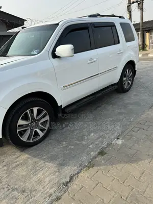 Honda Pilot Touring w/RES/Navi 4WD (3.5L 6cyl 5A) 2012 White