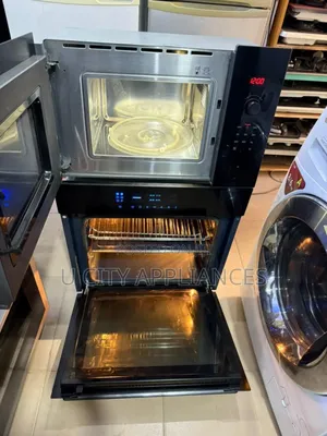 Inbuilt Bosch Microwave and Samsung Soft Touch Oven