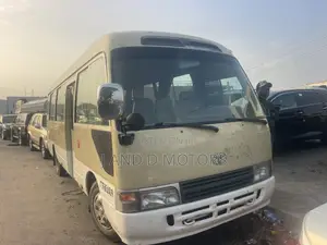 Toyota Coaster 2018 Gold