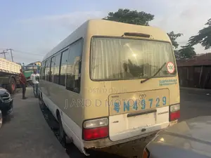 Toyota Coaster 2018 Gold