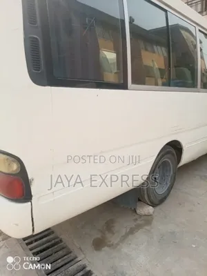 Coaster Bus Durable, Neat, With Air Condition for Rent