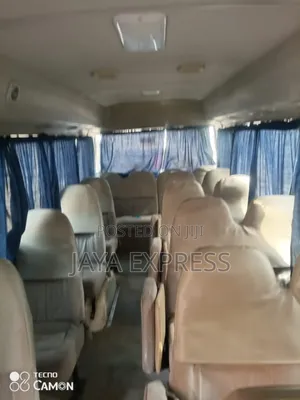 Coaster Bus Durable, Neat, With Air Condition for Rent