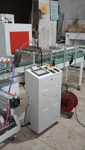 Automatic Shrink Wrapping Machine Automatic Shrink Wrapping Machine
