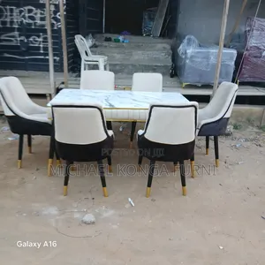 Unique 6 Seaters Dinning With High Gloss Top