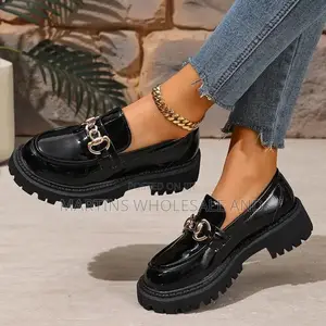 Black Patent Leather Chunky Loafers With a Croc-Embossed Pattern