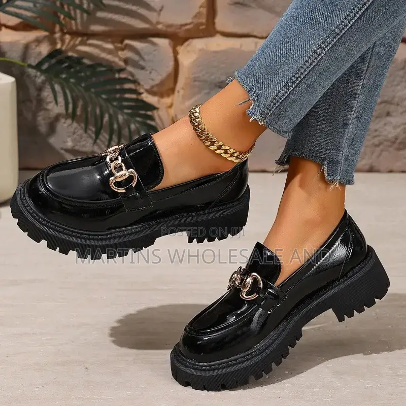 Black Patent Leather Chunky Loafers With a Croc-Embossed Pattern
