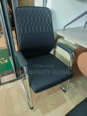 Executive Leather Visitors Chair With Armrest.