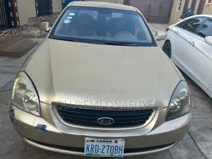 Kia Optima EX Sedan FWD (2.4L 4cyl 5A) 2008 Gold