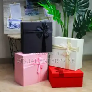 Different Colors of Gift Boxes With Ribbons