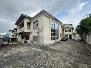 Land Measuring 1200sqm With a Building Which Consists of 22rooms For