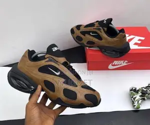 Nike Air Max Muse Se Shoes in a Brown and Black Colorway. Sneakers