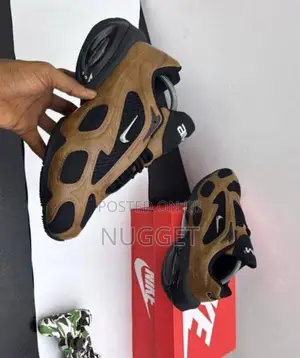 Nike Air Max Muse Se Shoes in a Brown and Black Colorway. Sneakers