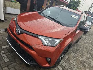 Toyota RAV4 SE AWD (2.5L 4cyl 6A) 2016 Orange