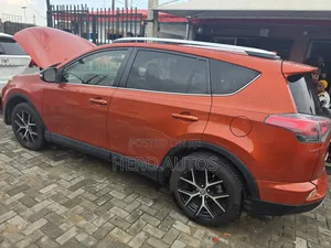 Toyota RAV4 SE AWD (2.5L 4cyl 6A) 2016 Orange
