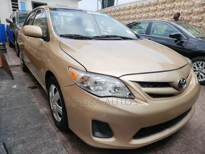 Toyota Corolla LE 4dr Sedan (1.8L 4cyl 4A) 2011 Gold