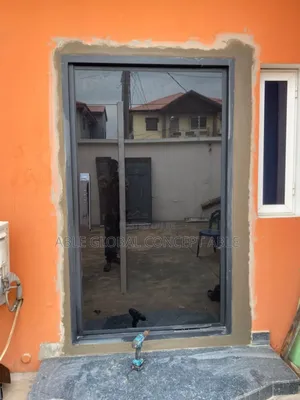 Plain Black Pivot Entrance Door