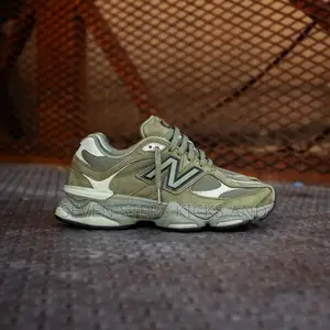 Cop the New Balance 9060 Dark Olive Luxury Sneakers