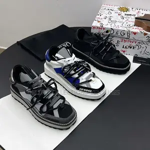 *Dolce Gabbana Mixed-Materials Space Sneakers.