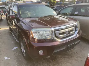 Honda Pilot EX-L 4dr SUV 4WD (3.5L 6cyl 5A) 2010 Red