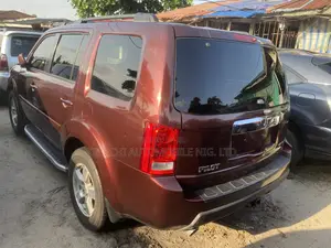 Honda Pilot EX-L 4dr SUV 4WD (3.5L 6cyl 5A) 2010 Red