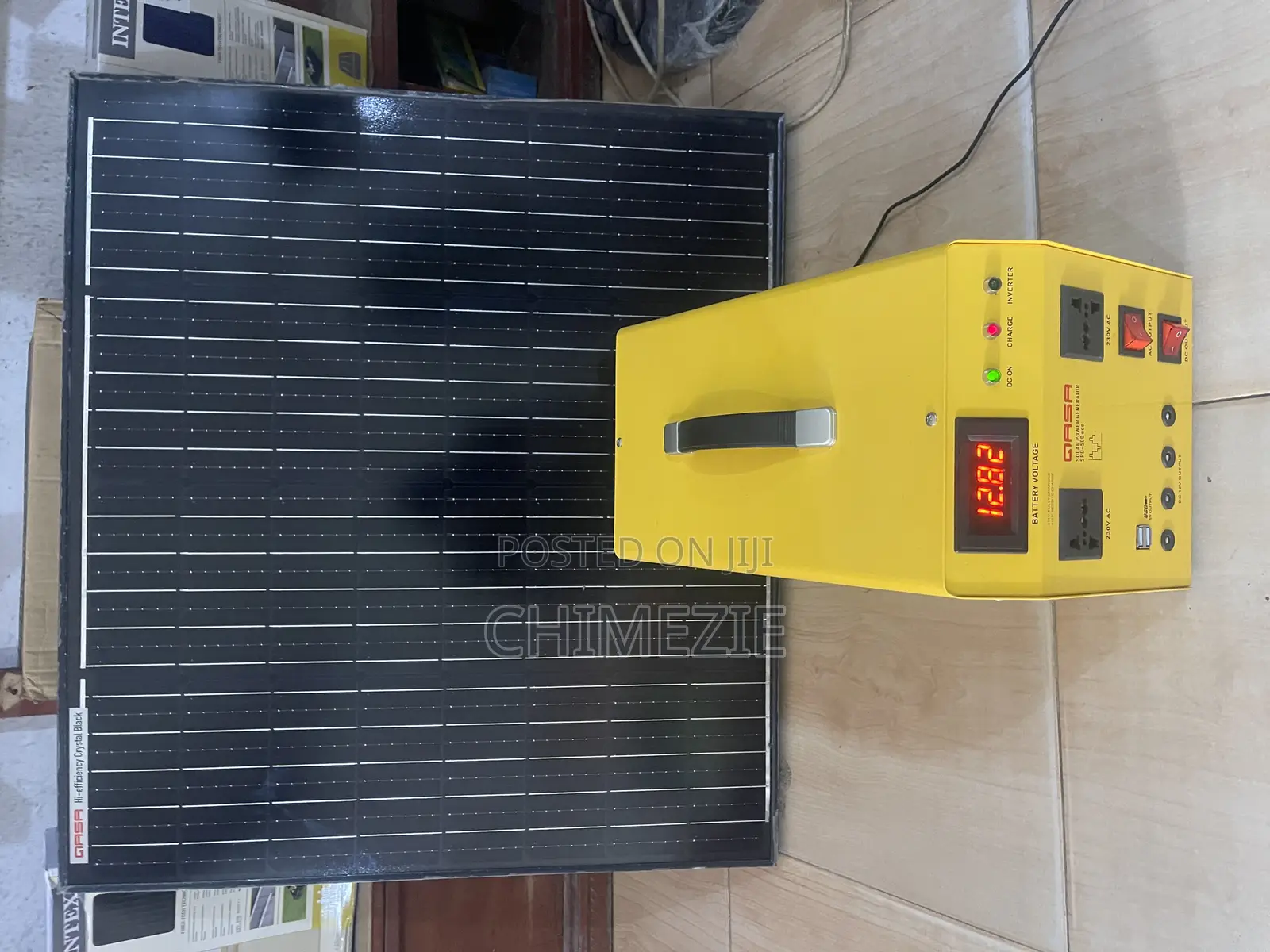 Qasa Solar Power Generator Unit Connected to a 100watts Solar Panel