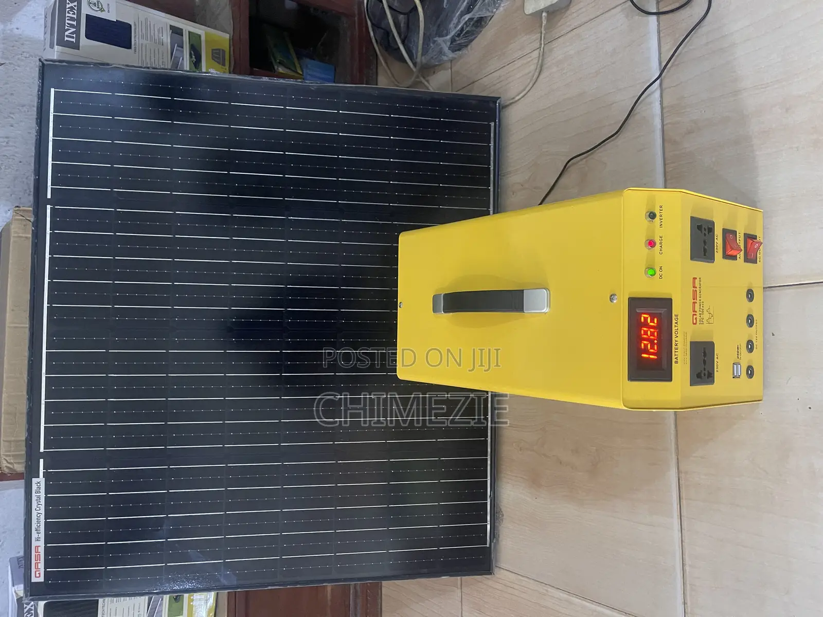 Qasa Solar Power Generator Unit Connected to a 100watts Solar Panel