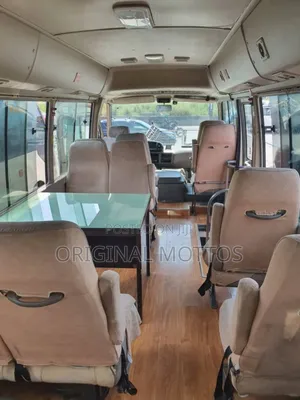 Toyota Coaster 2012 Gold