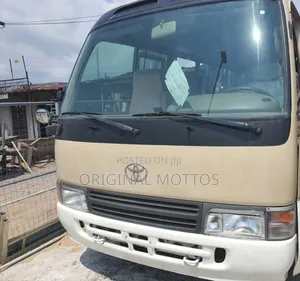 Toyota Coaster 2012 Gold