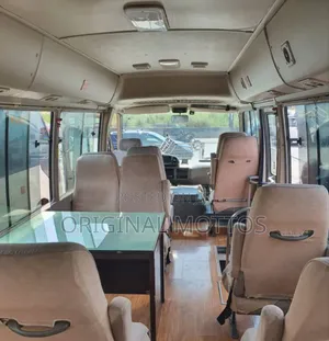 Toyota Coaster 2012 Gold