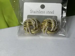 Round Twisted White Pearl and Gold Steel Embellished Earrings