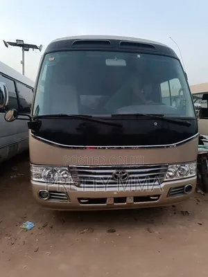 Toyota Coaster 2015 Gold