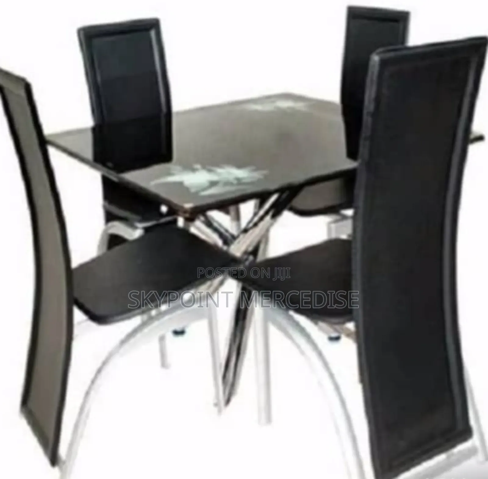 A Set of Glass Dinny Chairs Andtable