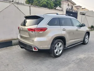 Toyota Highlander Limited 4dr SUV (3.5L 6cyl 6A) 2015 Gold