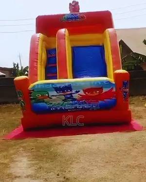 Pj Masks Slide Bouncy Castle for Rent.