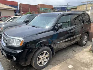 Honda Pilot Touring w/RES/Navi 4WD (3.5L 6cyl 5A) 2010 Black