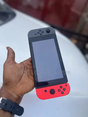 Nintendo Switch + Games Installed Both Fc26,Mk, Car Race Others