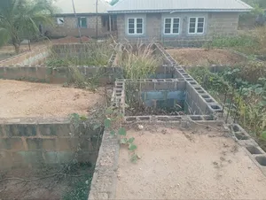 One Plot of Land With Incomplete 3bedroom Flat Foundation