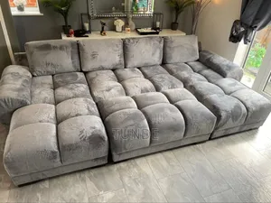 Sofa WTH Ottoman That Also Serve as Bed Wen Place in Front of the Sofa