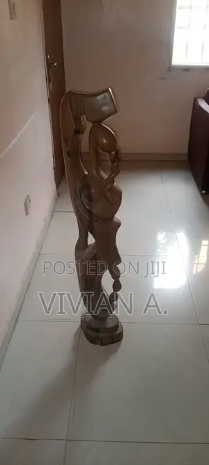 Wood Sculpture of Man and Woman Joined Together