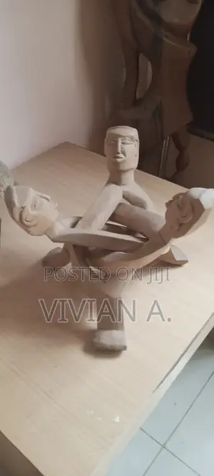 Wood Sculpture of 3 Men Joined Together