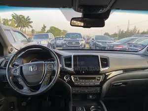 Honda Pilot Touring 4dr SUV 4WD (3.5L 6cyl 9A) 2017 Silver