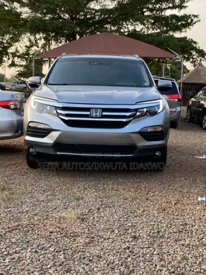 Honda Pilot Touring 4dr SUV 4WD (3.5L 6cyl 9A) 2017 Silver