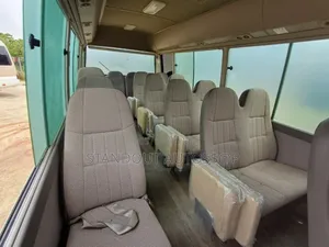 Toyota Coaster 2017 Gold