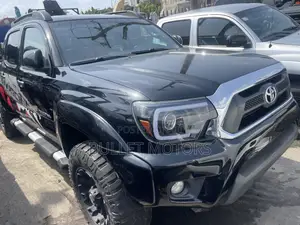 Toyota Tacoma V6 4dr Access Cab 4WD 6.1 ft. SB (4.0L 6cyl 6M) 2014
