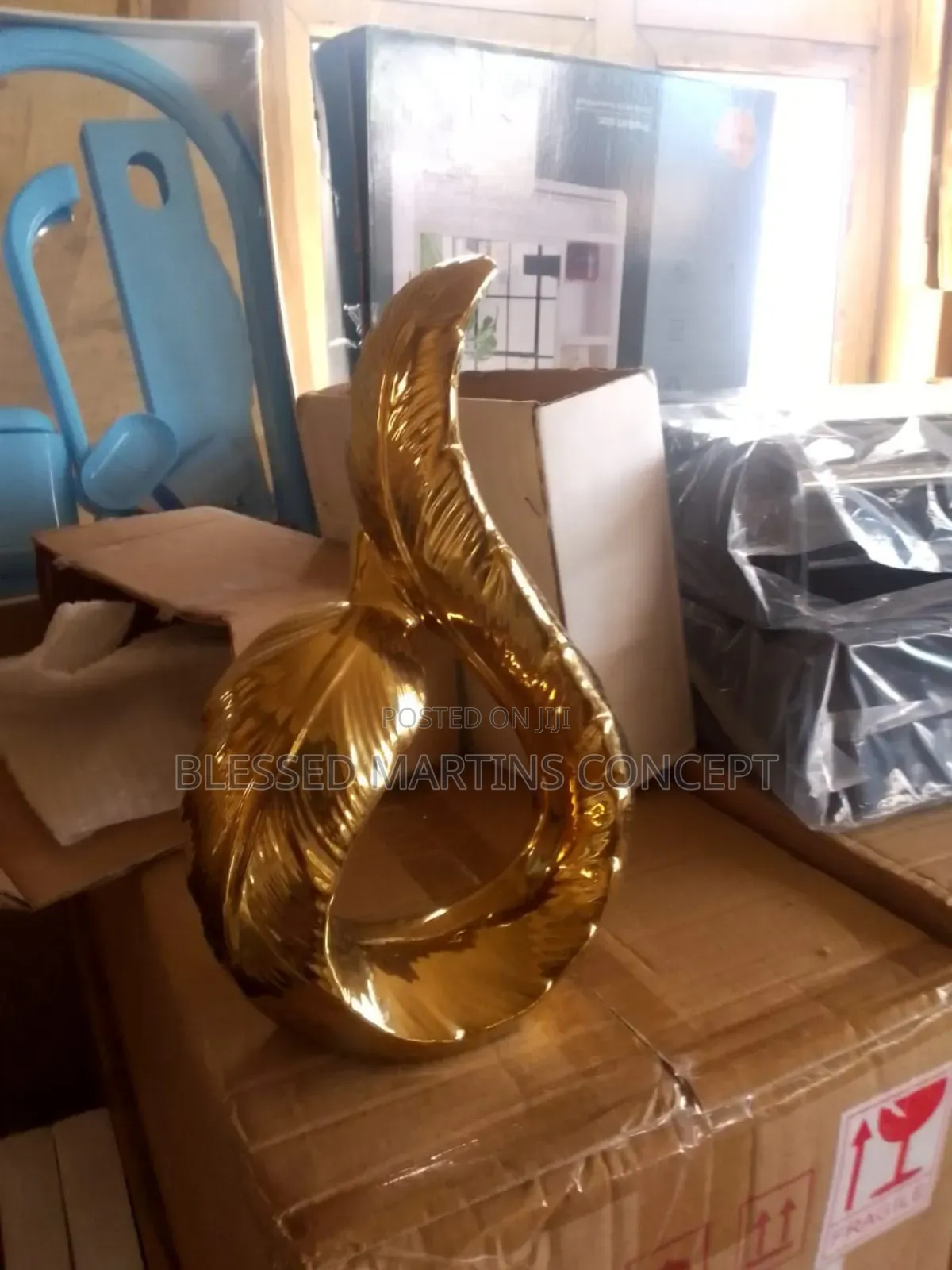 This Is a Gold-Finished Abstract Feather Sculpture.